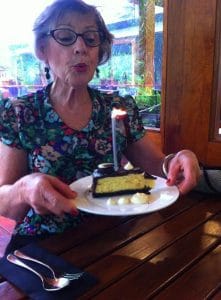Jane blowing out a candle on her birthday cake